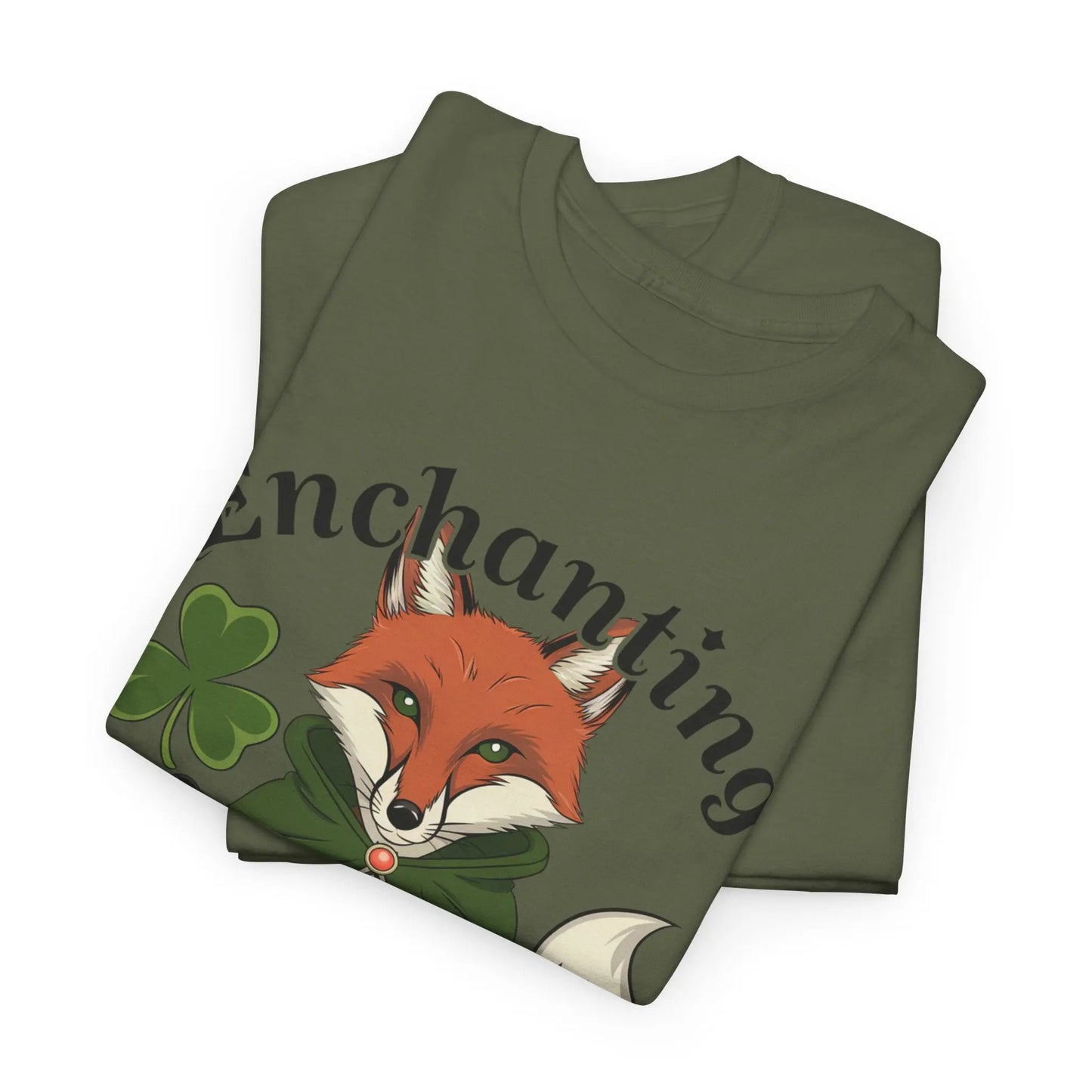 Folded military green tee with a fox design featuring a four-leaf clover, pentagram necklace, and the words 'Enchanting Luck.' witchypets.com