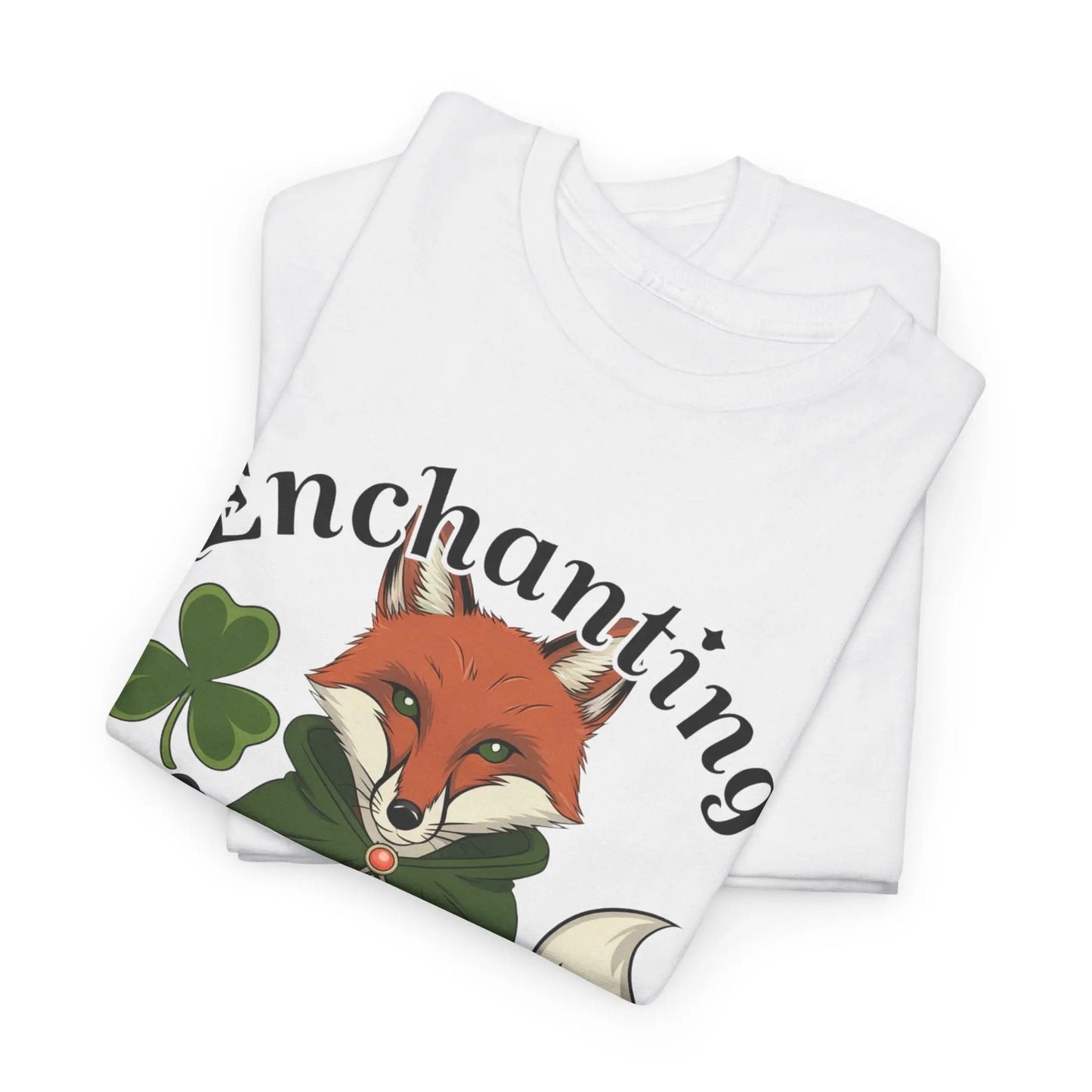 White folded tee featuring a fox design with a four-leaf clover, pentagram necklace, and the words 'Enchanting Luck.' witchypets.com